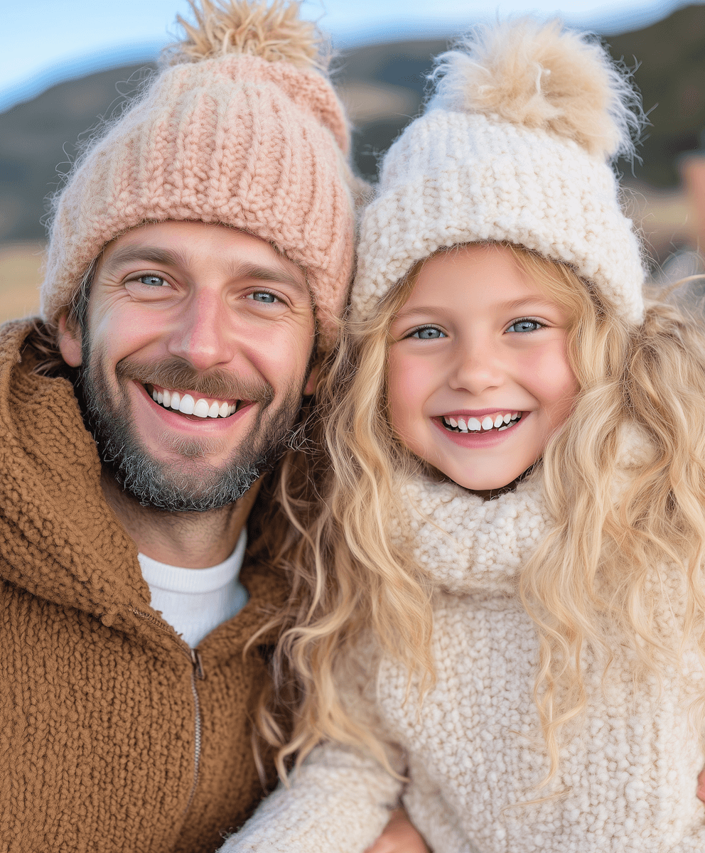 Father and daughter in beanies